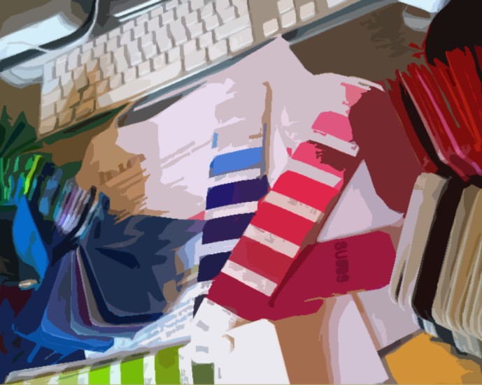 design studio showing colour swatches on a desk with keyboard