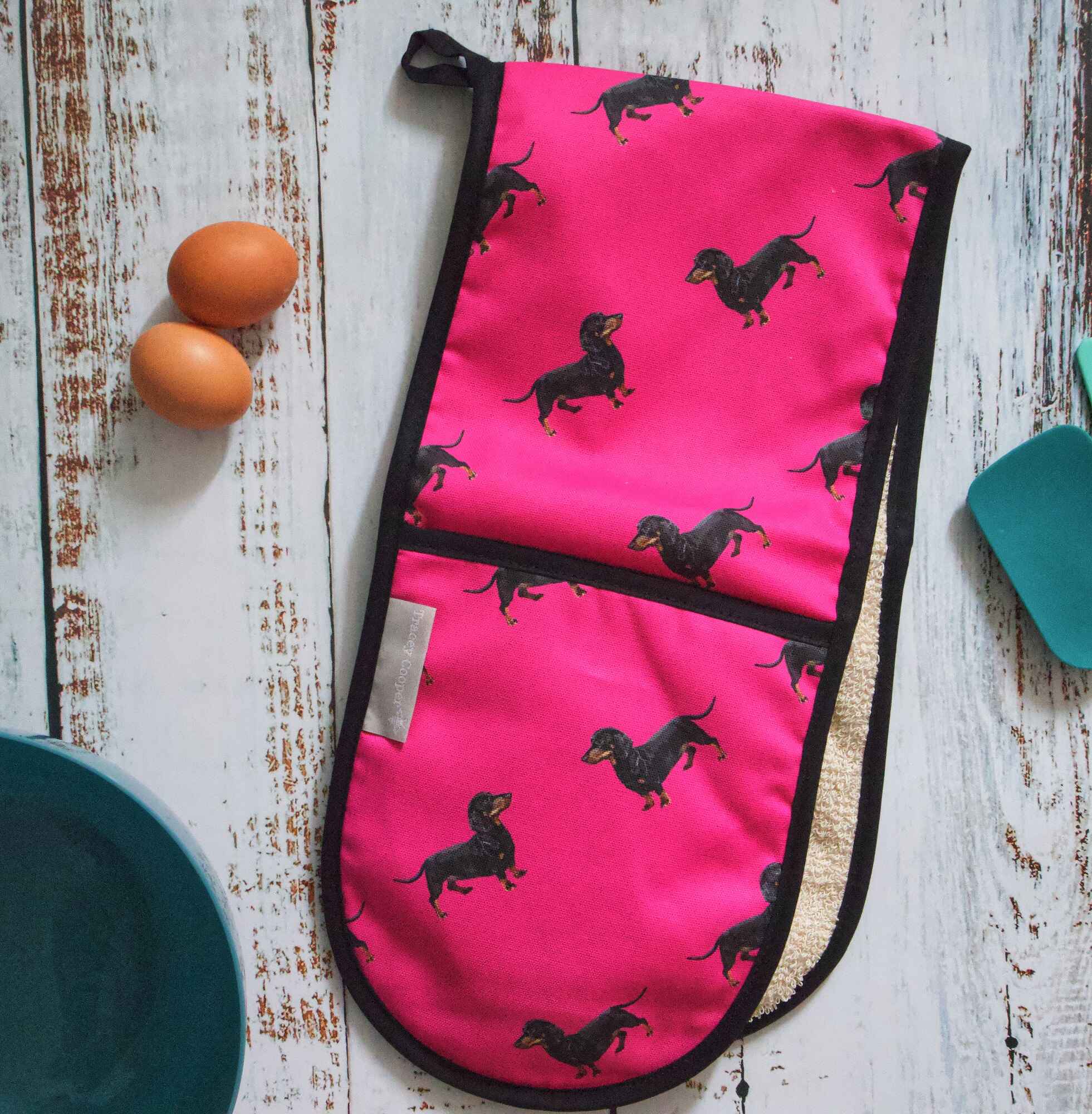 pink dachsund sausage dog pattern oven gloves